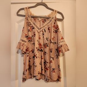 Pink flowered top with cutout sleeves